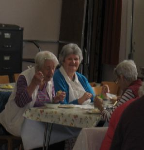 Enjoying tea of homemade soup and cake.