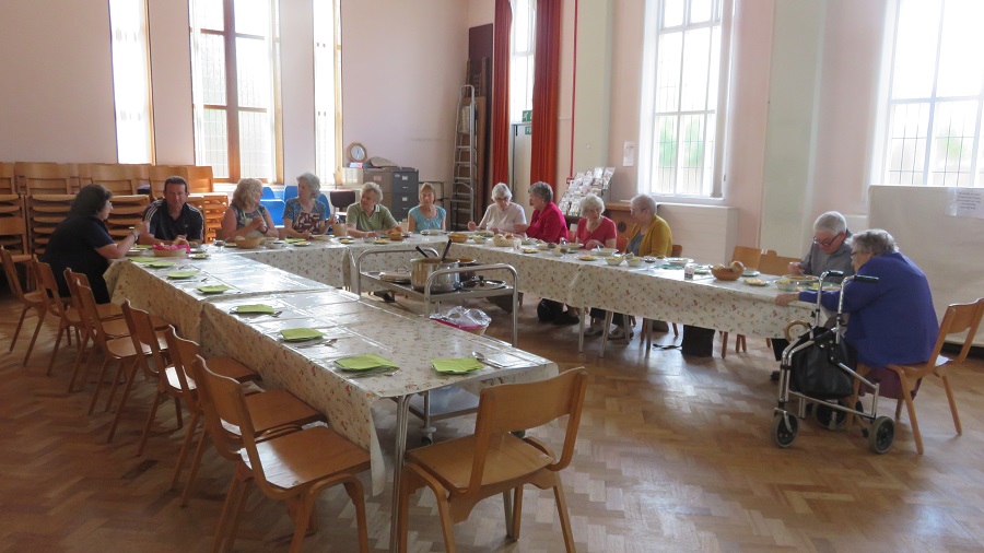 Enjoying sharing fellowship over a meal of soup after the Ascension Day service.