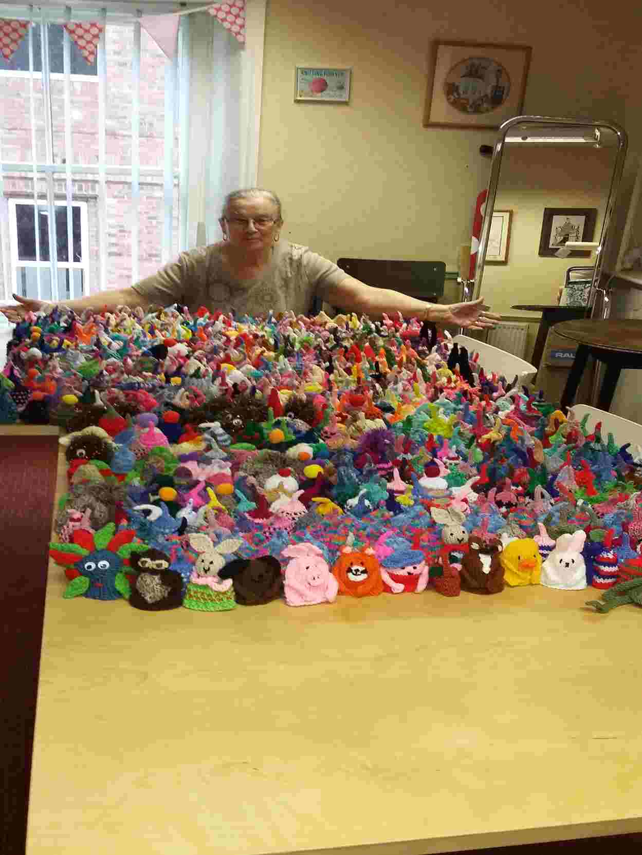 Over one thousand smoothie hats knitted by M&G Designs knitters for charity age uk